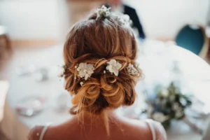 Collection of six elegant bridal hair styling designs from the back.