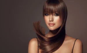 Model with sleek and shiny hair after keratin hair treatment.